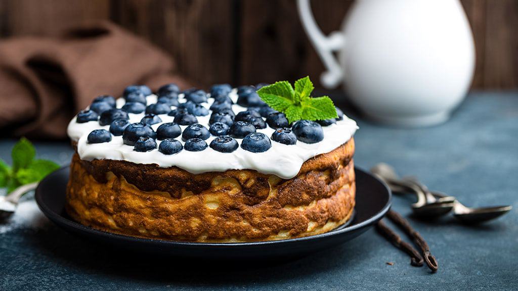 blueberry cake with fresh berries and whipped.jpg